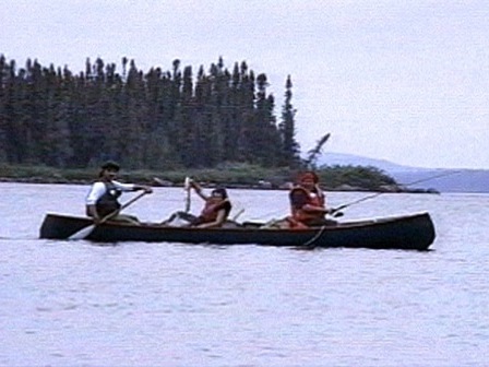 Fishing on a lake in a canoe