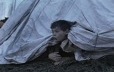 Innu children perform manual tasks in a school in Unaman-shipu