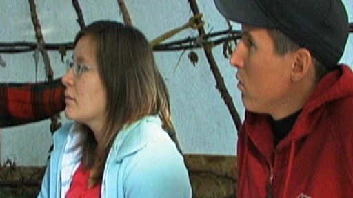 Young couple listening attentively to a grandmother’s teachings