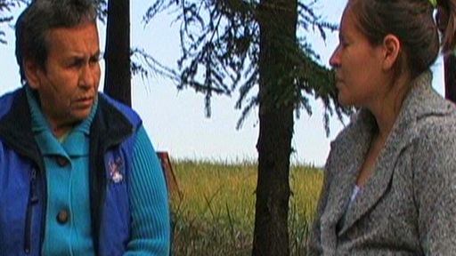 Young pregnant woman listening to a grandmother’s teachings