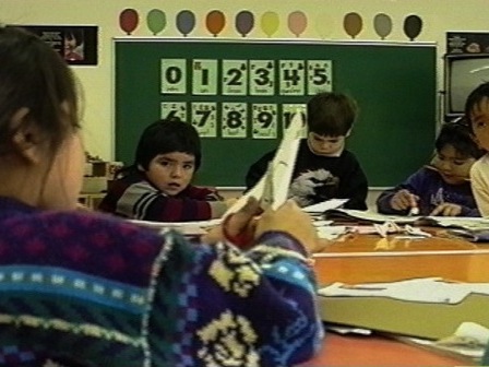 Innu children perform manual tasks in a school in Unaman-shipu